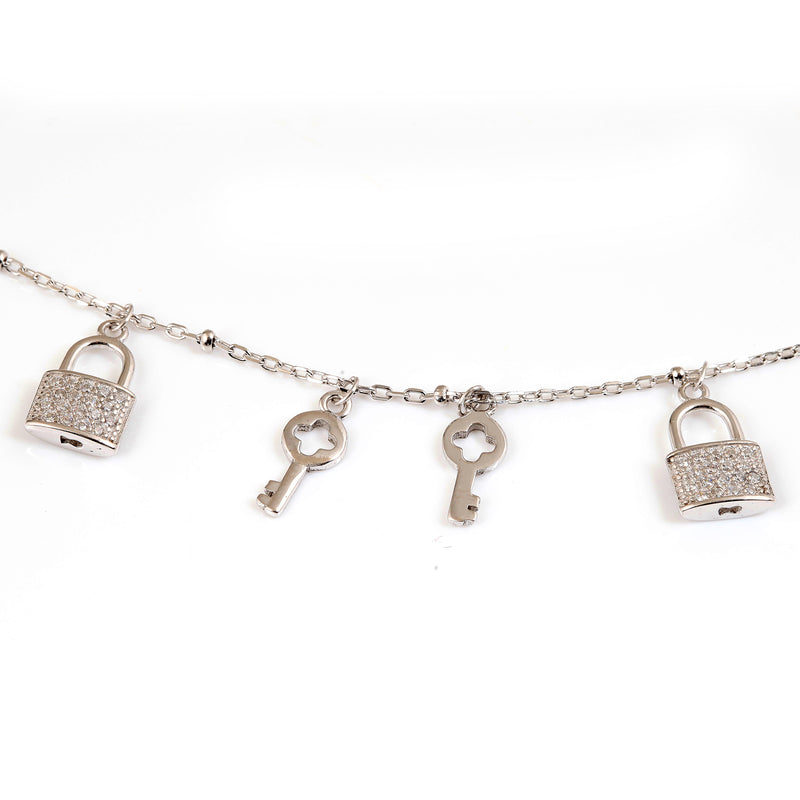 Sterling silver lock and key charm bracelet