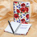 2 HARDBACK POPPY-DESIGNED NOTEBOOKS AND PEN SET