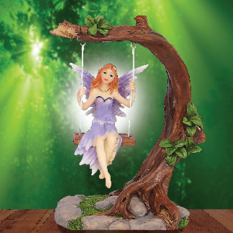 FOREST FAIRY ON A TREE SWING ORNAMENT